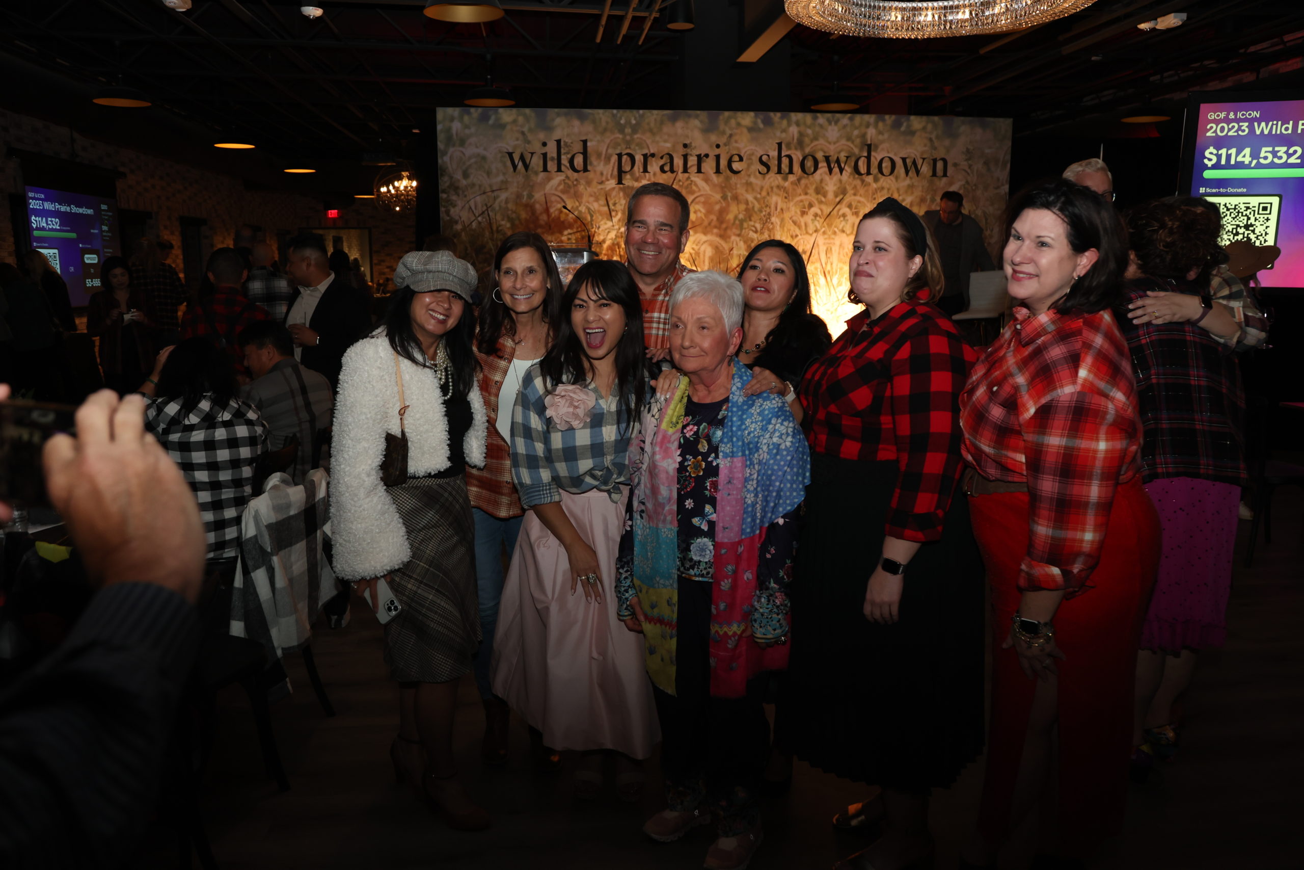 A group of people in fun fashion posing together