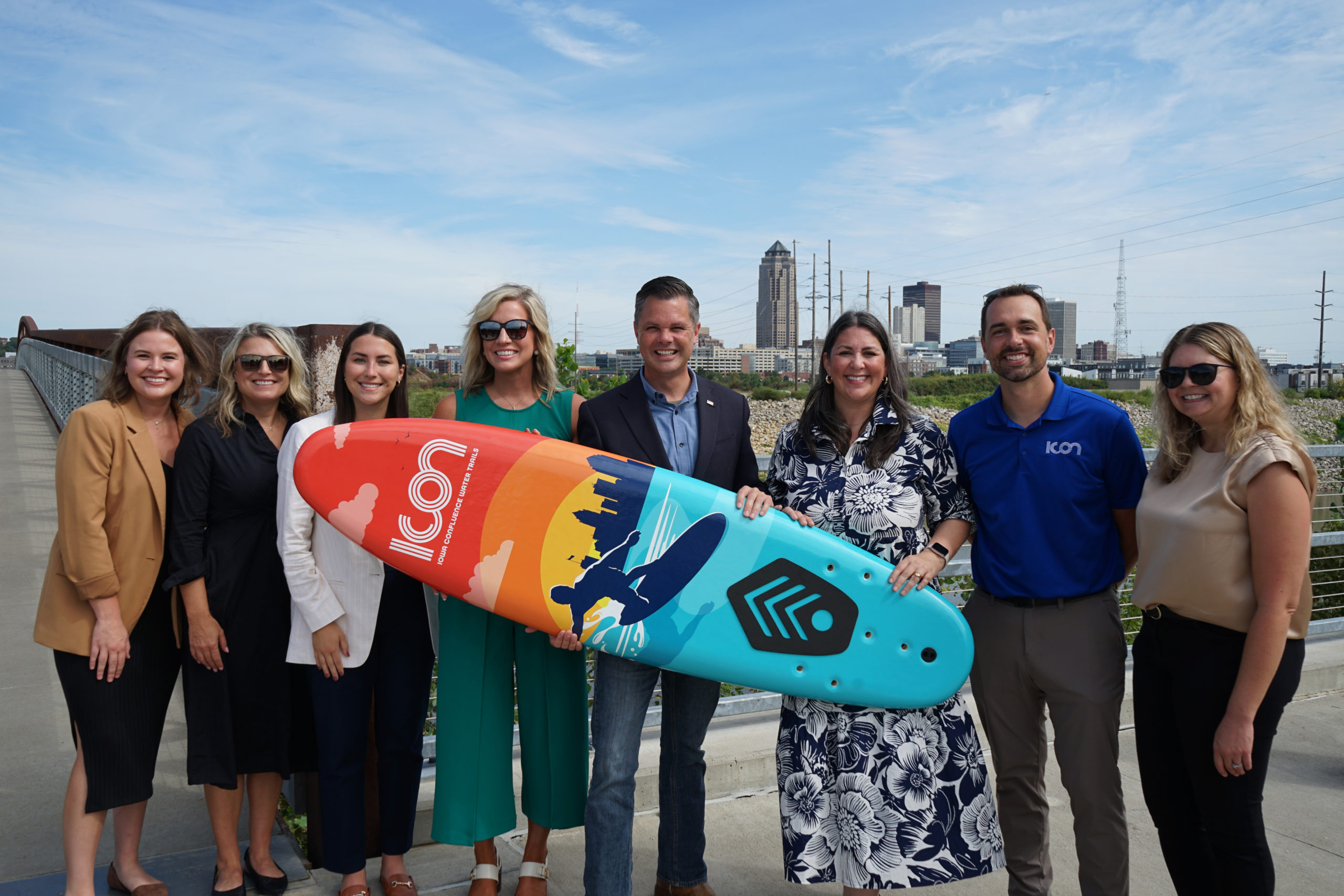 Rep Nunn and the ICON team with the ICON surfboard